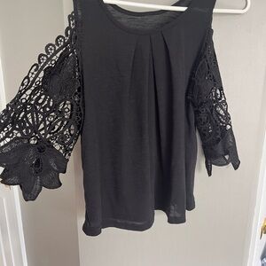 Women’s work tops. The black top has never been worn and the A.T top worn twice